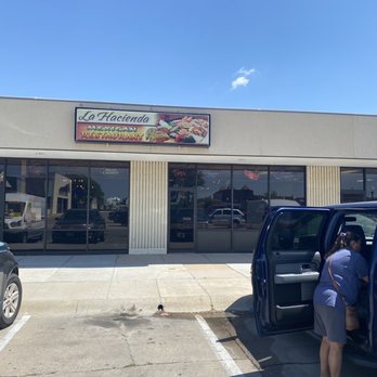 La Hacienda - a woman getting out of a car - Mexican Near Me - North Platte, Nebraska La Hacienda - a woman getting out of a car - Mexican Near Me - North Platte, Nebraska