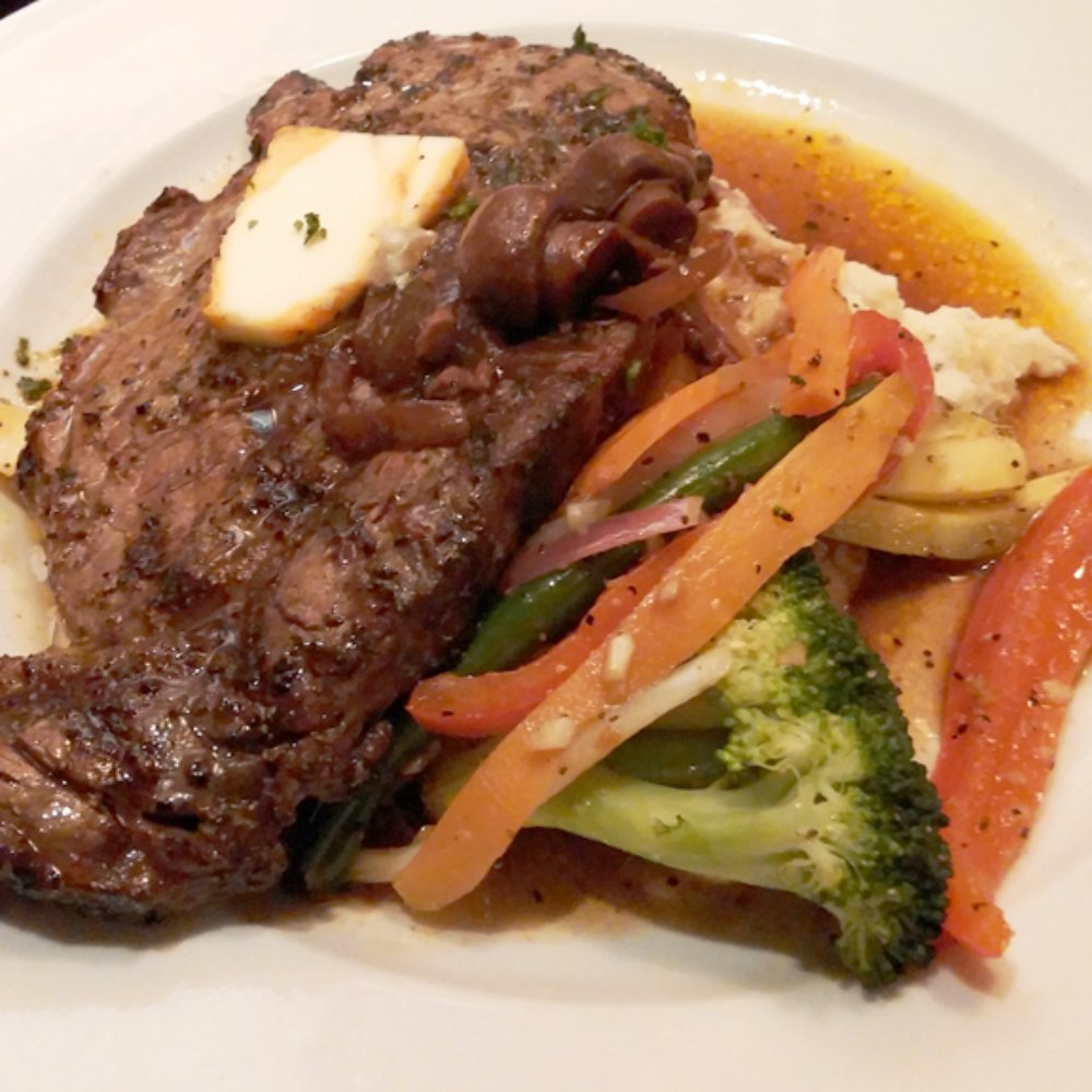 Ports Cafe - Cracked Pepper and Garlic Rib Eye - New American Near Me - Geneva, New York Ports Cafe - Cracked Pepper and Garlic Rib Eye - New American Near Me - Geneva, New York
