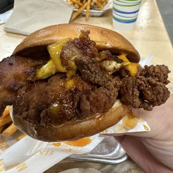 Egg N Bird - Egg N Bird Sandwich ($11ish) - thick pieces of juicy chicken tenders, crack sauce, hot honey, cheese, bacon, fried egg, and soft brioche bun - Chicken Shop Near Me - Cypress, California