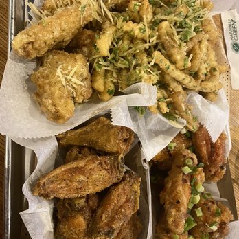 Fire Wings - Clockwise from top left: garlic Parmesan wings, garlic fries, Saigon Street wings and lemon pepper wings - Chicken Wings Near Me - Brea, California Fire Wings - Clockwise from top left: garlic Parmesan wings, garlic fries, Saigon Street wings and lemon pepper wings - Chicken Wings Near Me - Brea, California