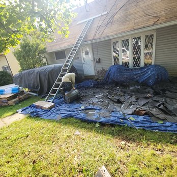 Restoration Roofing - no dwarf crape myrtles or other plants were harmed during the making of this roof! - Roofing Near Me - Glenwood, Maryland Restoration Roofing - no dwarf crape myrtles or other plants were harmed during the making of this roof! - Roofing Near Me - Glenwood, Maryland
