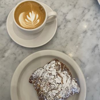 Tulie Bakery - Almond croissant and a flat white - Coffee & Tea Near Me - Salt Lake City, Utah Tulie Bakery - Almond croissant and a flat white - Coffee & Tea Near Me - Salt Lake City, Utah