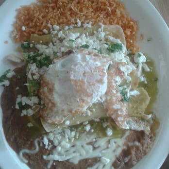 Charritos - Enchiladas (pollo y queso), salsa verde, arroz, frijoles, huevo estrellado. - Mexican Near Me - Kansas City, Missouri Charritos - Enchiladas (pollo y queso), salsa verde, arroz, frijoles, huevo estrellado. - Mexican Near Me - Kansas City, Missouri