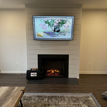 Tristate TV Mounting - LG Gallery TV installed over a custom, fireplace build-out. - TV Mounting Near Me Tristate TV Mounting - LG Gallery TV installed over a custom, fireplace build-out. - TV Mounting Near Me