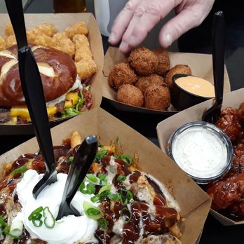 Thompson Brewing - Pub burger top left,  hush puppies top right,  pulled pork fries bottom left, maple chipotle wings bottom left.  All delicious. - American Near Me - Riverside, California