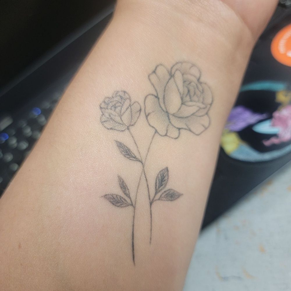 One of my first tattoos. Love the line work she did. One of my first tattoos. Love the line work she did.