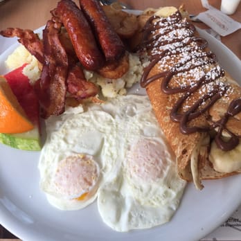 L'Oeufrier - Le petit gourmande. Eggs, bacon, sausage, two type of potatoes (mashed/homefries), banana Nutella crepe. - Breakfast & Brunch Near Me - Montreal, Quebec L'Oeufrier - Le petit gourmande. Eggs, bacon, sausage, two type of potatoes (mashed/homefries), banana Nutella crepe. - Breakfast & Brunch Near Me - Montreal, Quebec