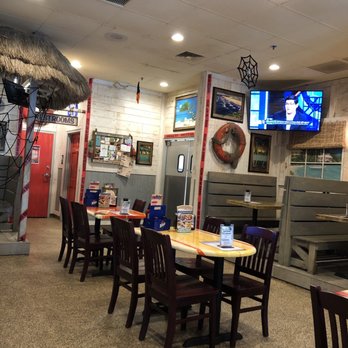 Hurricane Grill & Wings - Dining room low tops - Chicken Wings Near Me - Jacksonville, Florida