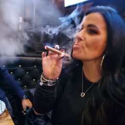 My beautiful wife having her first cigar gifted by the best host/owner Mike! Thank you! My beautiful wife having her first cigar gifted by the best host/owner Mike! Thank you!