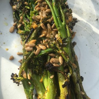 Carnal - Charred broccolini with shishito oil and smoked sunflower seeds - New American Near Me - Bellingham, Washington Carnal - Charred broccolini with shishito oil and smoked sunflower seeds - New American Near Me - Bellingham, Washington