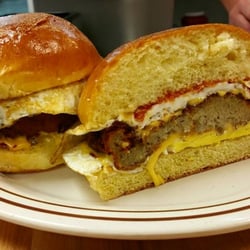 Alen's Deli and Catering - Potato Pancake Egg and Cheese on a Brioche Roll