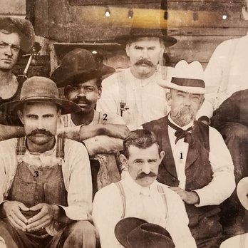 The Jack Daniel Distillery - In the beginning some of the VIPs with Mr. Daniel. - Distilleries Near Me - Lynchburg, Tennessee