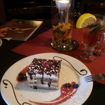 Ragazzi - Homemade tiramisu is delightfully rich in rum, rather than cheese as found often elsewhere. - Italian Near Me - Green Valley, Arizona Ragazzi - Homemade tiramisu is delightfully rich in rum, rather than cheese as found often elsewhere. - Italian Near Me - Green Valley, Arizona
