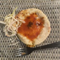 Station Plaza Deli - Revueltas (mixed) pupusa with curtido (slaw) and salsa. Made to order. Takes 10 to 15 minutes and well worth the wait!