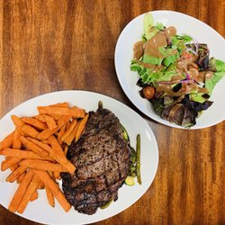 The Mill Steakhouse and Wine Bar - Ribeye with sweet potato fries and salad!