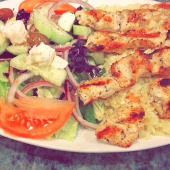 Aegea West - This is a picture of their chicken kabob platter with rice. It comes with a greek salad, pita and tzatziki. - Mediterranean Near Me - Douglaston, New York