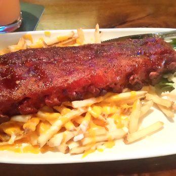 Kildares Ale House - a plate of ribs and coleslaw - Pubs Near Me - Calgary, Alberta