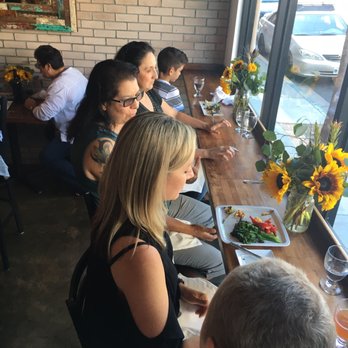 Taste Wine-Beer-Kitchen - Satisfied group. The served "family style." - New American Near Me - Long Beach, California Taste Wine-Beer-Kitchen - Satisfied group. The served "family style." - New American Near Me - Long Beach, California