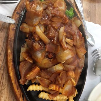 Saint Anna Cafe Shop - Pork chop special (pork chop is buried under the onions) - Cafes Near Me - Oakland, California