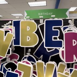 Party City - The yard letters were $7 but I couldn't find what I needed in stock and matching colors. I recommend ordering online