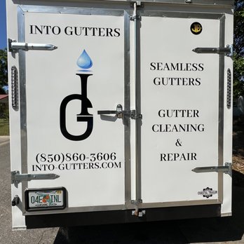 Into Gutters - Trailer back door. - Gutter Services Near Me