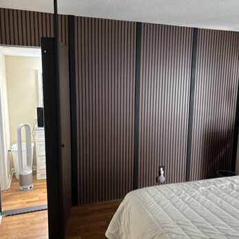 Next Day Painting - There is the door, it has shelves on the other side of the hidden door. - Painters Near Me - Palm Coast , Florida Next Day Painting - There is the door, it has shelves on the other side of the hidden door. - Painters Near Me - Palm Coast , Florida