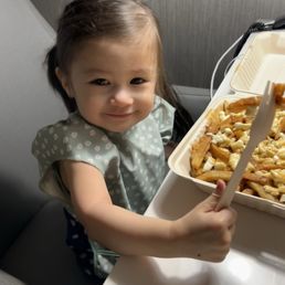 Our daughter's first poutine
