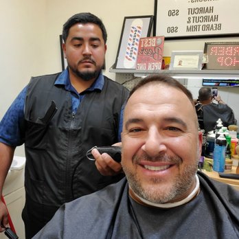 The Cave Hype - Uzzi cutting customers hair - Barbers Near Me - Phoenix, Arizona The Cave Hype - Uzzi cutting customers hair - Barbers Near Me - Phoenix, Arizona