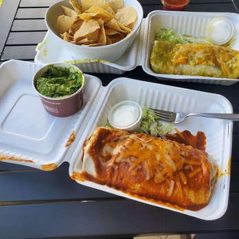 Fred's Mexican Cafe - Carne asada and chile verde burrito with chips and guacamole. We only were able to eat half. - Mexican Near Me - Kihei, Hawaii
