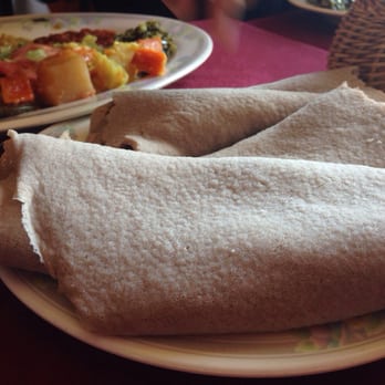 Ethiopian House Restaurant - Injera bread (has a soft spongy taste; very chewy) - Ethiopian Near Me - Toronto, Ontario Ethiopian House Restaurant - Injera bread (has a soft spongy taste; very chewy) - Ethiopian Near Me - Toronto, Ontario