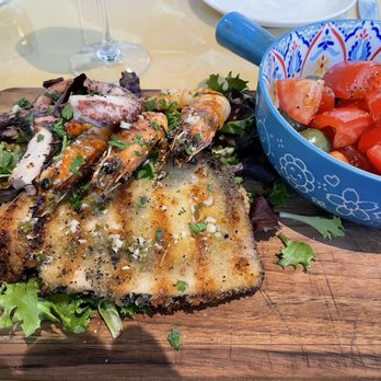 Amuri - The special of the day. A grilled seafood platter of swordfish, octopus, and prawns with salad. - Italian Near Me - San Diego, California