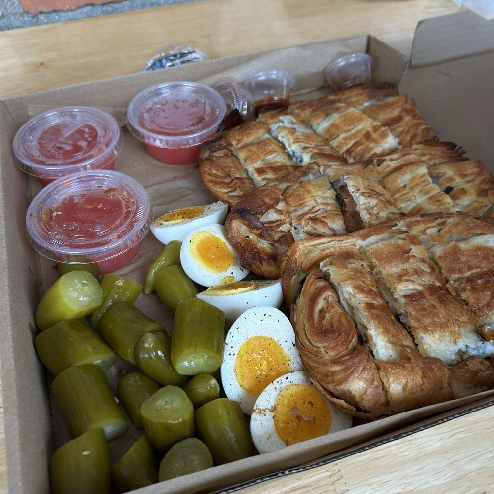 Borekas Sephardic Pastries - Another angle of these lovely, perfectly flaky borekas. My BF couldn't wait and grabbed half of a hard boiled egg! - Bakeries Near Me - Sherman Oaks, California Borekas Sephardic Pastries - Another angle of these lovely, perfectly flaky borekas. My BF couldn't wait and grabbed half of a hard boiled egg! - Bakeries Near Me - Sherman Oaks, California