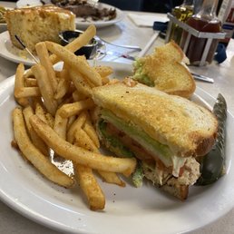 Tune amount on sourdough bread with seasoned fries and cornbread. I drizzled some honey and the fake butter. It was yummy.