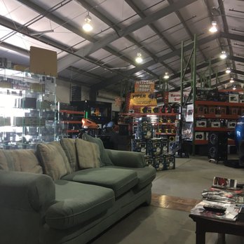 Pacific Audio And Tinting - View from one of two couches overlooking the main showroom floor with products. - Auto Detailing Near Me - Fort Bliss, Texas