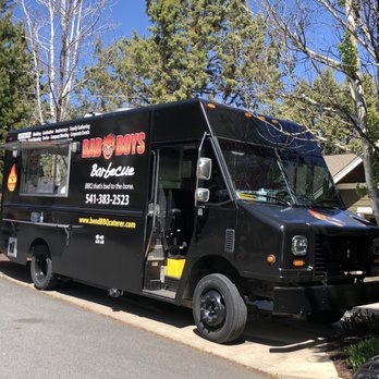 Bad Boys BBQ - a black food truck parked on the side of the road - Barbeque Near Me - Bend, Oregon Bad Boys BBQ - a black food truck parked on the side of the road - Barbeque Near Me - Bend, Oregon