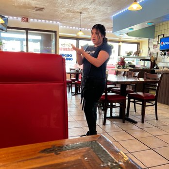 Five Stars Diner - a woman standing in a restaurant - New American Near Me - Hatfield, Pennsylvania
