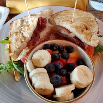 Untoasted - Untoasted Club Sandwich with a of Side Mixed Fruits - Breakfast & Brunch Near Me - Hallandale Beach, Florida Untoasted - Untoasted Club Sandwich with a of Side Mixed Fruits - Breakfast & Brunch Near Me - Hallandale Beach, Florida