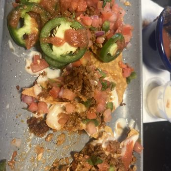 Lil Beaver Brewery - Nachos are soooooo good (obviously)... I get extra pico and cheese and add the red salsa.  Best nachos around! - Breweries Near Me - Bloomington, Illinois