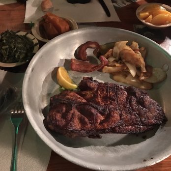 Lambert's Cafe - Ozark - This was a pork steak, with a couple of pieces of the pork jowls, some fried potatoes, turnip greens, and candied yams. Sooooo stuffed! - American Near Me - Ozark, Missouri Lambert's Cafe - Ozark - This was a pork steak, with a couple of pieces of the pork jowls, some fried potatoes, turnip greens, and candied yams. Sooooo stuffed! - American Near Me - Ozark, Missouri