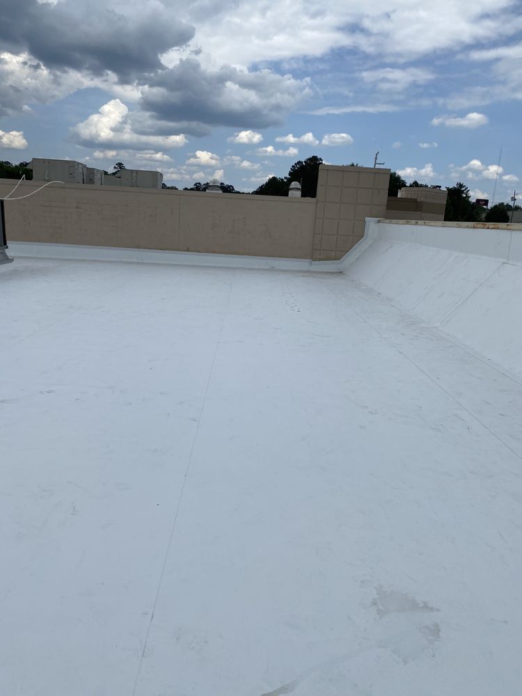 Slide of Ray’s Commercial Roofing Construction