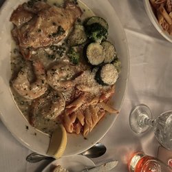 Nello's Place - Seafood Platter with Scallops, Shrimp Scampi, Petrale Sole, Pasta, and Vegetables.