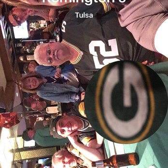 Remingtons Sports Bar - a group of people at a bar - Sports Bars Near Me - Tulsa, Oklahoma Remingtons Sports Bar - a group of people at a bar - Sports Bars Near Me - Tulsa, Oklahoma