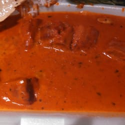 Auckland Airport Kiwi Motel - $21 for butter chicken- six bites of chicken, plain white rice.  Horrible.