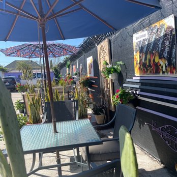 Pollo and Boba - a patio with tables and chairs - Bubble Tea Near Me - Los Angeles, California