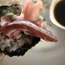 Yellowtail hand roll. Poor quality fish in it.