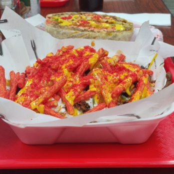 Fatima's Grill - Loaded Carne Asada Fries with Hot Fries on top and a crunchwrap. - Mediterranean Near Me - Downey, California Fatima's Grill - Loaded Carne Asada Fries with Hot Fries on top and a crunchwrap. - Mediterranean Near Me - Downey, California