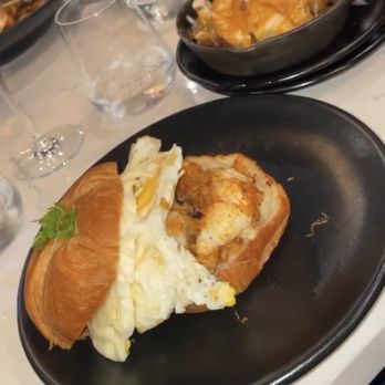 BLK SWAN - Lobster croissant and potato casserole. - New American Near Me - Baltimore, Maryland