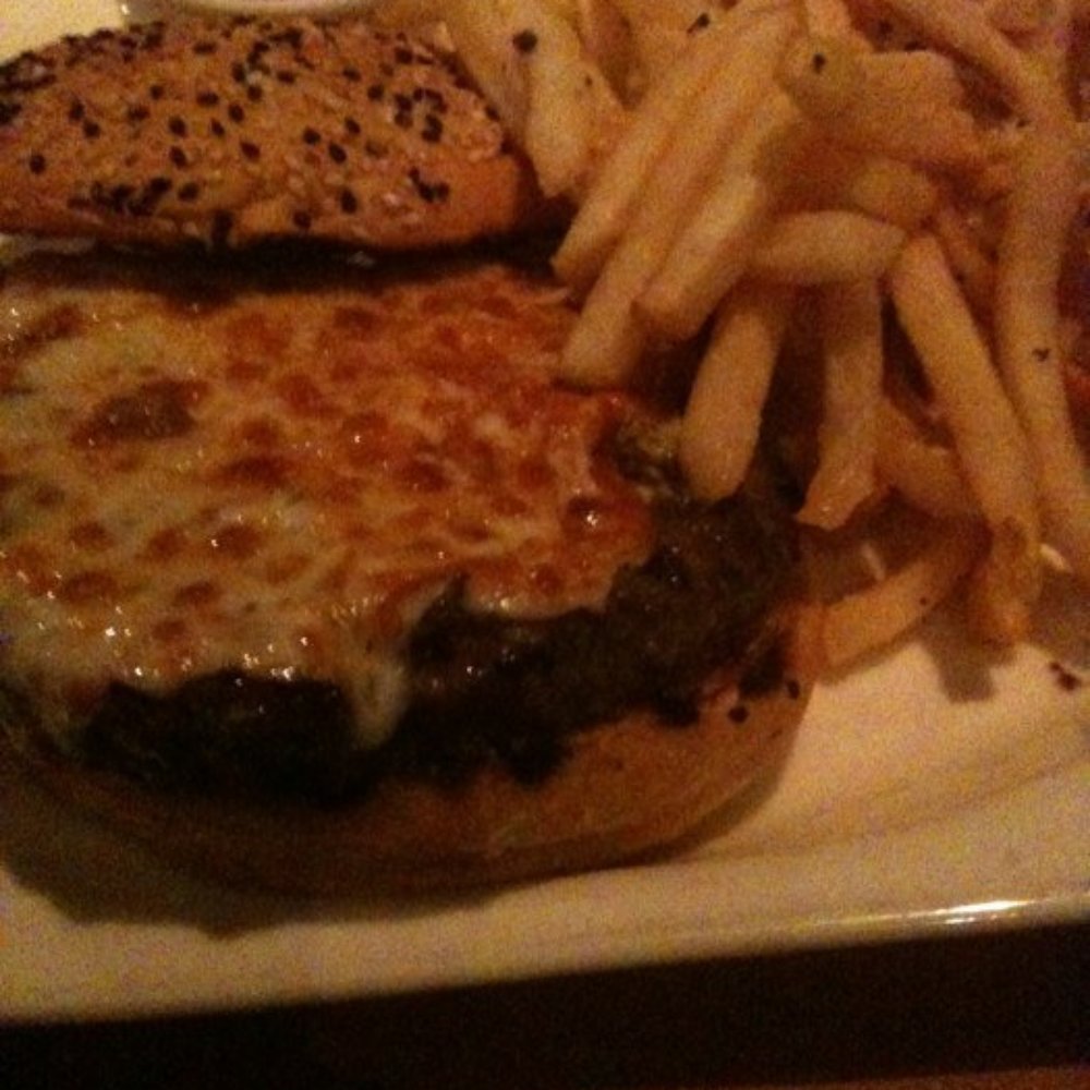 Pamplemousse Grille - Kobe beef burger topped with truffle cheese and truffled Parmesan fries - New American Near Me - Solana Beach, California Pamplemousse Grille - Kobe beef burger topped with truffle cheese and truffled Parmesan fries - New American Near Me - Solana Beach, California