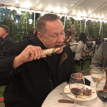 Fresco Steak & Seafood Grill - Tomahawk Rib Eye for 2 $90 for the steak, mashed potatoes, fried onion rings, seasonal vegetables Pat C pictured cleaning off the bone - Italian Near Me - Milltown, New Jersey