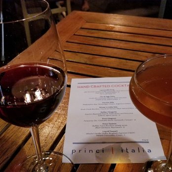 Princi Italia - Wine and cocktail out on the patio. Their cocktail menu isn't available online but they give you a physical menu. - Italian Near Me - Plano, Texas